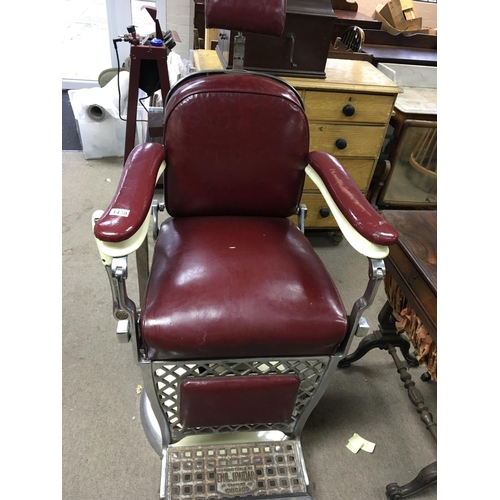 1206 - A Quality and rare Vintage 1930s Professional American barbers chair with a deep red upholstery and ... 