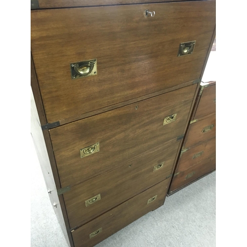 1208 - A campaign style brass bound chest of drawers fitted with four drawers