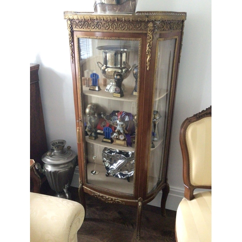 1223 - A French late 19th century display cabinet with a marble top and gilt metal mounts.