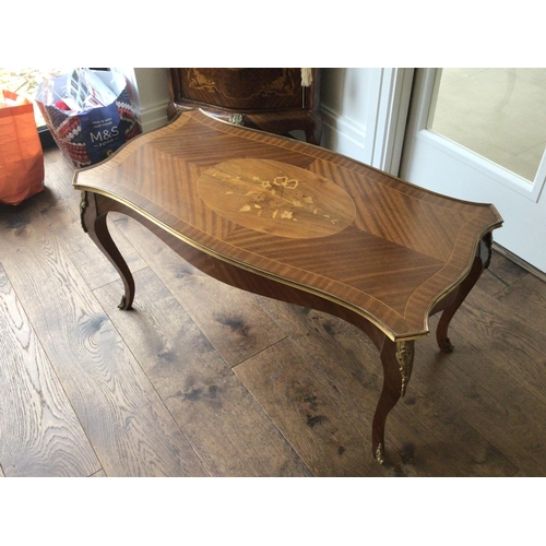 1224 - A French Louis XV style coffee table with gilt metal mounts