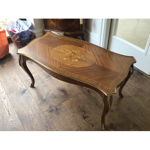 1224 - A French Louis XV style coffee table with gilt metal mounts