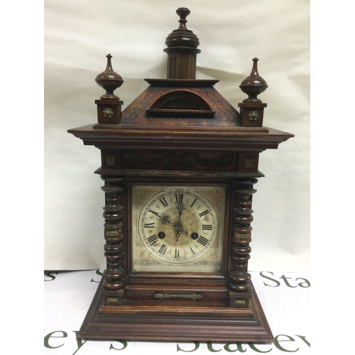 1234 - Two eight day mahogany cased mantle clocks with silvered dials. Shipping category D.