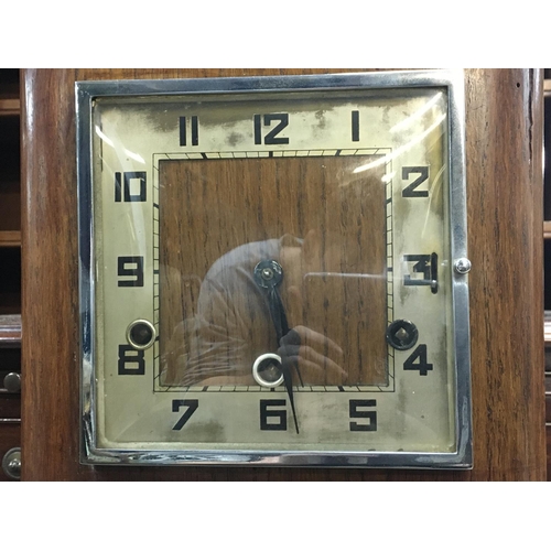 1241 - A 1940s Oak Veneered granddaughter clock with german movement. 100cm tall approximately