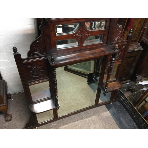 1277 - An Edwardian over mantle mirror. 115cm tall 92cm wide.