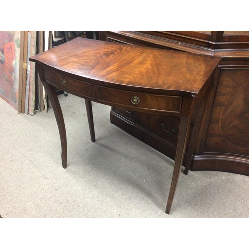 1285 - A Mahogany side table fitted with two drawers and with inverted legs width 86cm