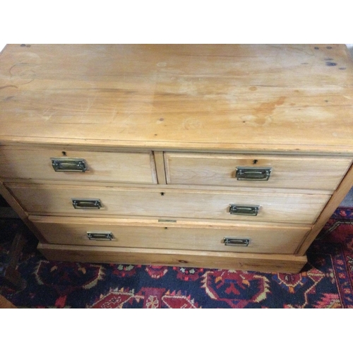 1295 - A light wood chest of drawers. 106 x 44 x 77cm.