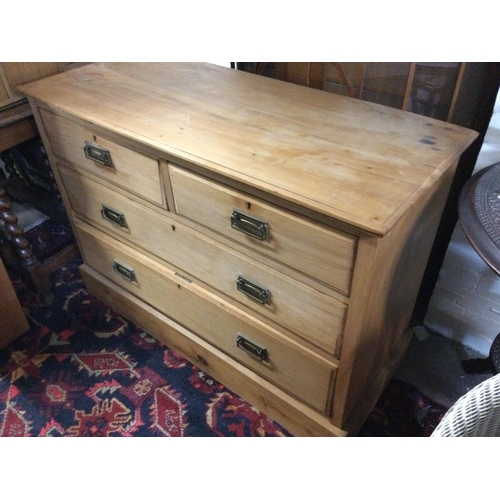 1295 - A light wood chest of drawers. 106 x 44 x 77cm.