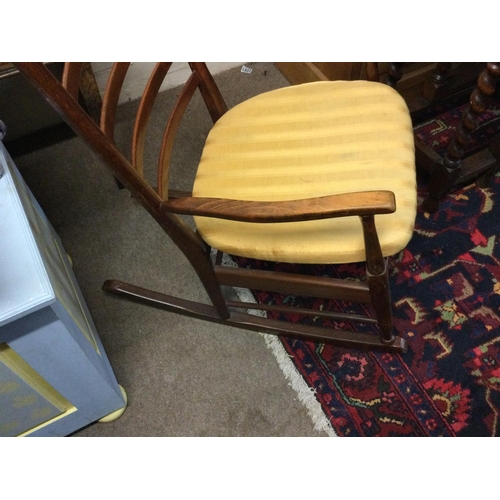 1298 - A beechwood leader back rocking chair