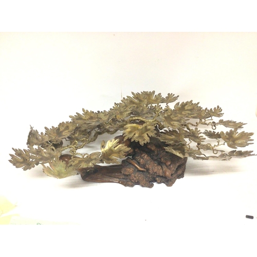 1299 - A 20th century sculpture root wood with applied gilt metal foliage with applied plaque Gerard 1979. ... 