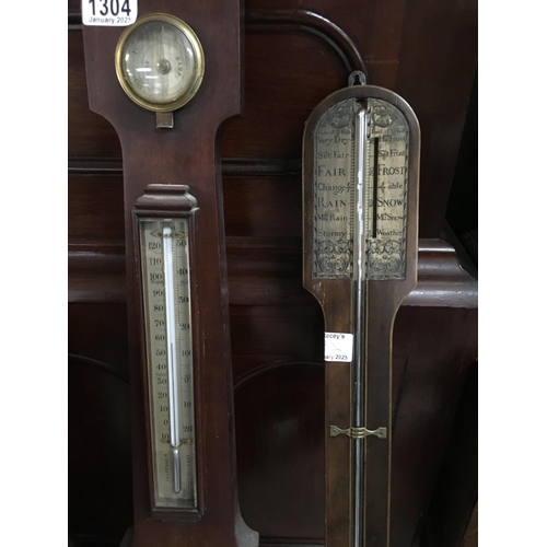 1304 - A mahogany stick barometer and one other barometer.