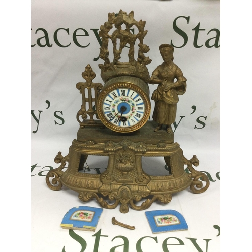 1324 - A French gilt mantle clock with painted enamel dial and further painted enamel panels, in need of at... 