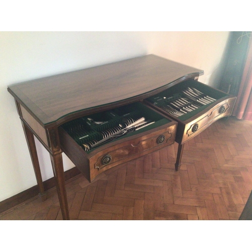 1329 - A Mahogany two drawer table with a fitted silver plate canteen of cutlery maker Walker Hall Sheffiel... 