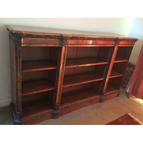 1331 - A quality Victorian French influence walnut open bookcase with gilt metal mounts a cross banded edge... 