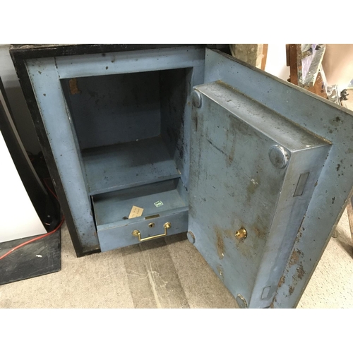 1357 - A vintage Phillips and sons safe with key. 60 x 38 x 43 cm