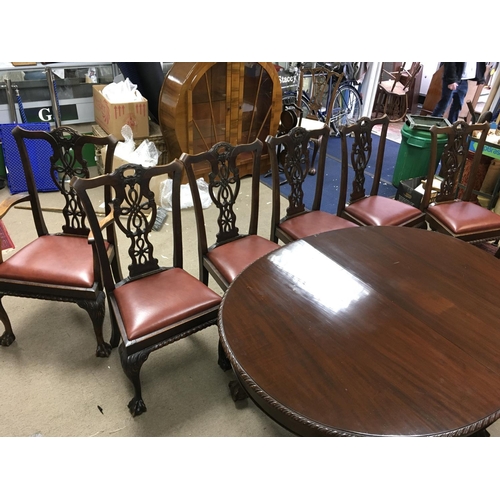 1359 - A set of 6 mahogany dining chairs two carvers and table. 140 x 110 cm