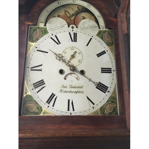 1370 - A oak long case clock the arched panted dial with moon roller Roman numerals and second dial .