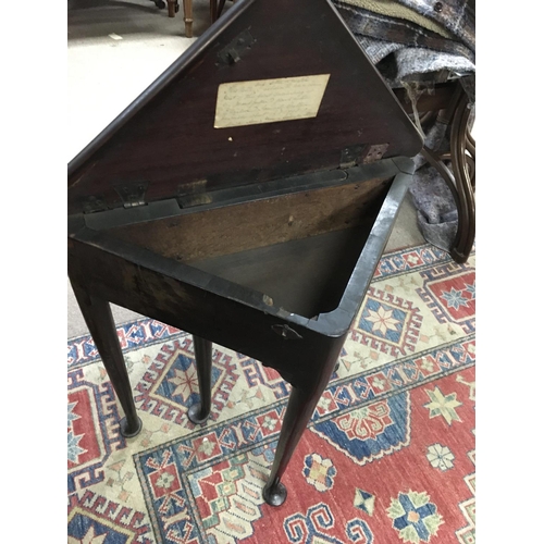 1389 - A unusual Georgian mahogany table with single flap the shape top with a enclosed compartment on squa... 