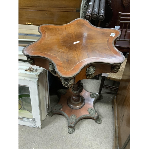 1400 - A French Louis XVI pedestal table quarter mahogany veneered with brass fittings.