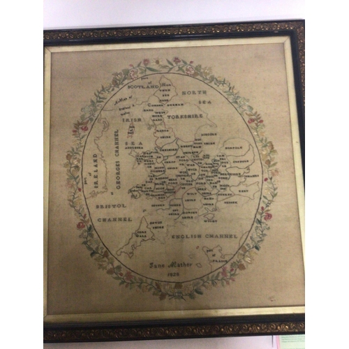 1517 - A framed early 19th century needlework sampler a map of the counties of England by Jane Mather 1828.... 