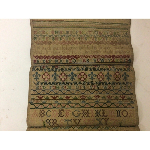 1518 - A mid 18th century needlework sampler dated 1743 by Mary Reader aged 14 the detailed needlepoint wit... 