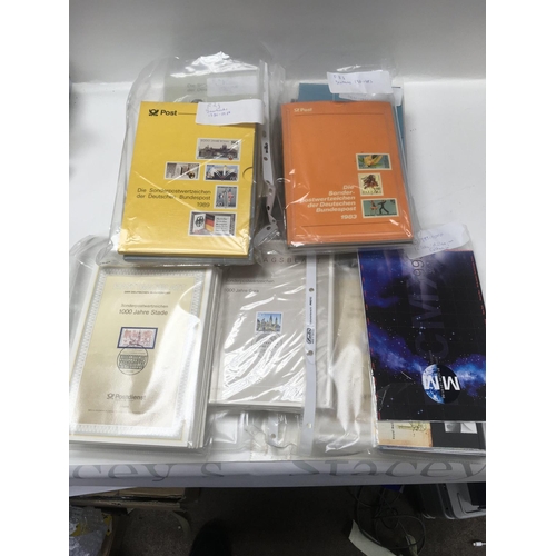 1716 - A box containing 1991-1995 German stamps, also including year books 1992-1995 86-89 and 80-83. And f... 