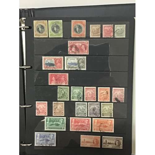 1721 - Five blue Alpha Stamp Albums containing British colonial and Empire stamps from Queen Victoria to El... 