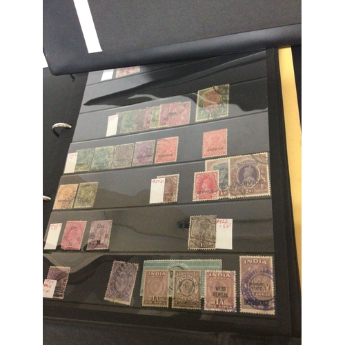 1721 - Five blue Alpha Stamp Albums containing British colonial and Empire stamps from Queen Victoria to El... 