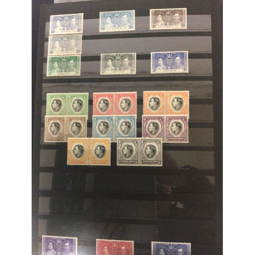 1724 - Three Albums containing British stamps from Queen Victoria to Elizabeth II including a good cross se... 