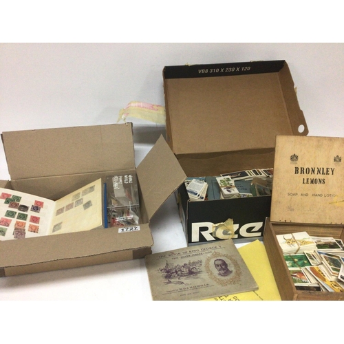 1727 - A box containing mixed stamps including a small album of British stamps a collection of Cigarette ca... 