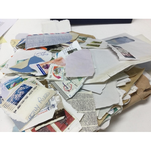1735 - A collection of stamps including first day covers, a world stamp album and loose stamps. Postage cat... 