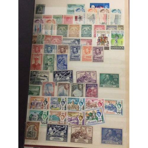 1737 - A collection of stamps in albums and on sheets a good selection of predominantly unused George VI Em... 