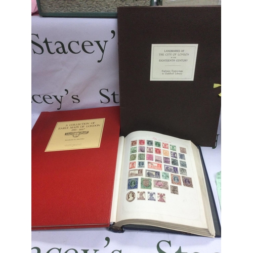 1740 - An album of world stamps plus two historic maps of London (3). Shipping category B.