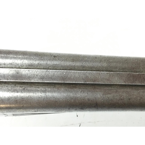 1807 - A Turners and sons 12g side by side shotgun with double trigger. Damascus twist 30 inch barrel. 1729... 