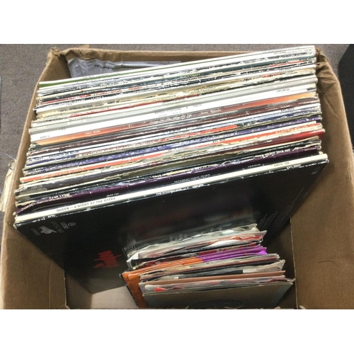 1813 - A box and a record case of LPs and 7