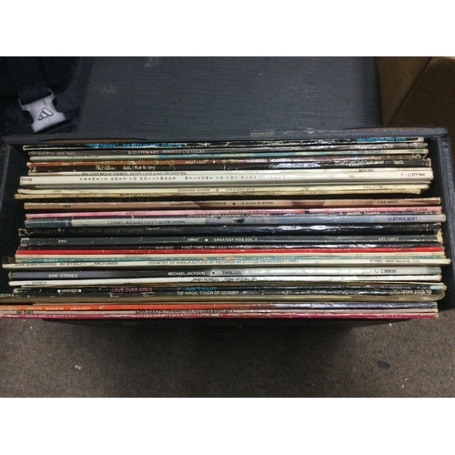 1813 - A box and a record case of LPs and 7
