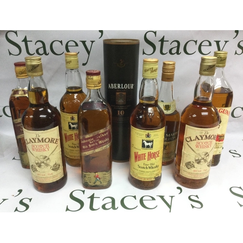 1815 - A collection of various whisky including some single malt examples. Shipping category D.