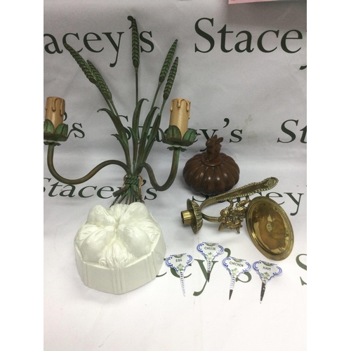 1827 - A collection of oddments comprising a ceramic jelly mould, brass sconce etc. Shipping category D.