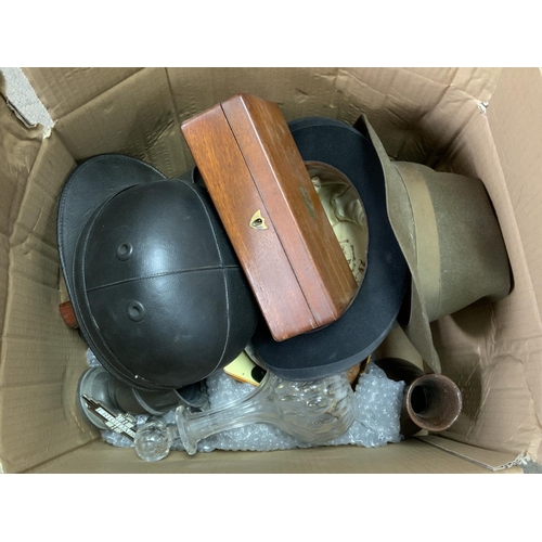 1963 - A box of various odds to include a driving helmet, ceramic, pewter etc.