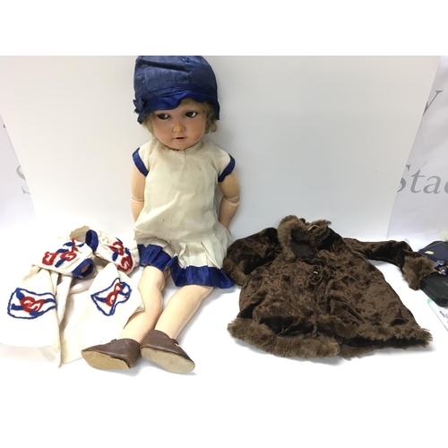 1982 - A German made vintage composition doll. Approximately 60cm. Postage B
