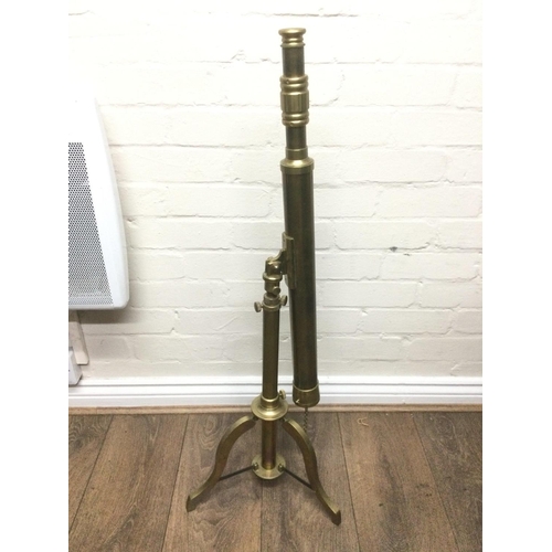 1984 - A brass telescope on stand, total approx length 90cm. Shipping category D.
