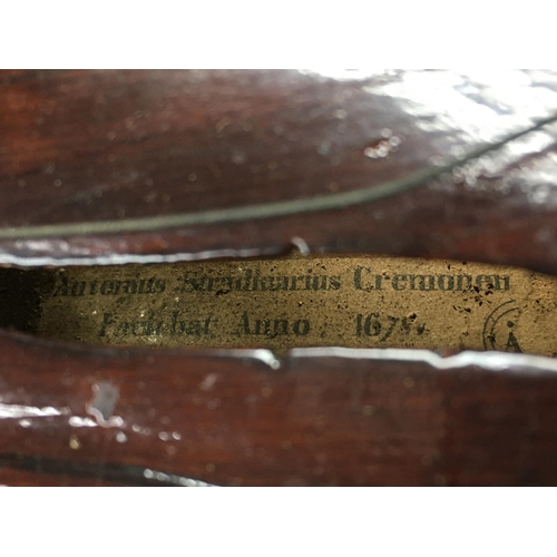 2000 - Two cased vintage violins including a stradivarius Copy, both violins in need of restoration. Postag... 