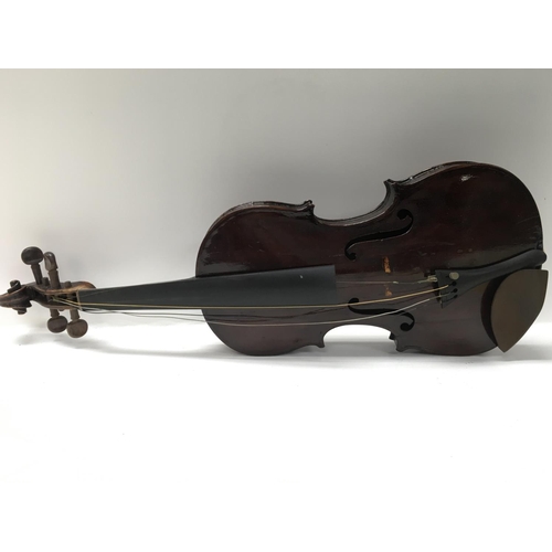 2000 - Two cased vintage violins including a stradivarius Copy, both violins in need of restoration. Postag... 