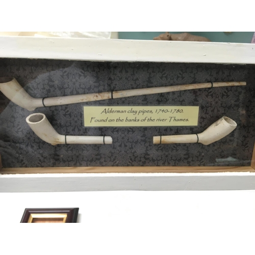 2005 - Cased collection of metal detector finds including Alderman Clay pipes dated 1740-1780. This lot can... 