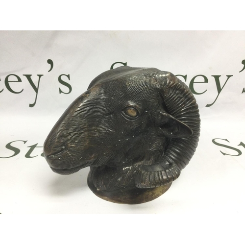 814 - A bronzed bust of a ram's head, approx height 15cm. Shipping category D.