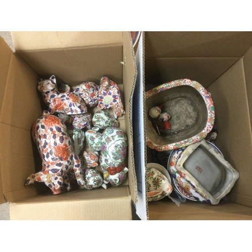 936 - Two boxes of Oriental ceramics comprising mainly moden imari animals and plates. Shipping category D... 