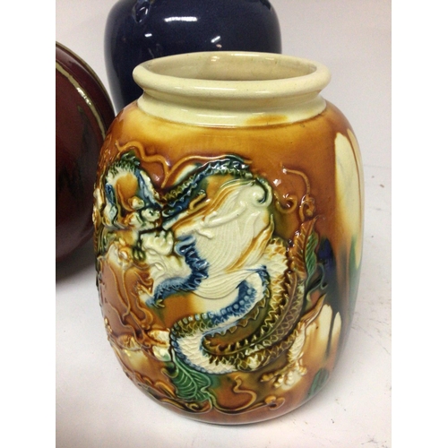 948 - Three Chinese Export ceramic 20th century vases one with raised relief with dragons and caricature m... 