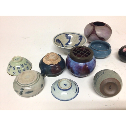 949 - A Chinese export 19th century ink well and a collection of 20th century Chinese ceramic vases and po... 