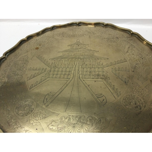 957 - A Japanese brass tray with Pagoda design, dimensions 40x40cm .postage category C