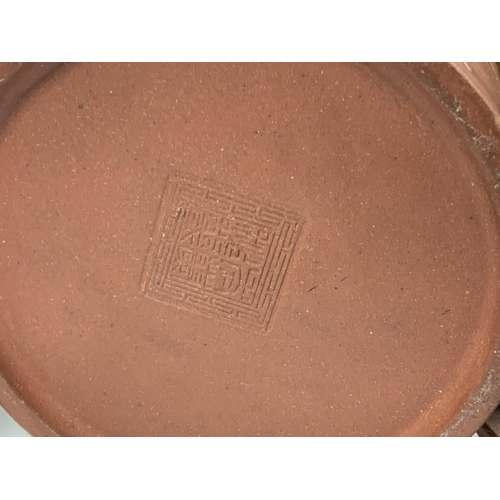 961 - An early Yi-Xing terracotta pottery teapot with internal filter, sgraffito decoration to body and 4 ... 