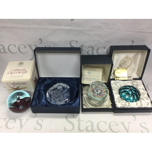 1000 - A collection of glass paperweights including boxed and loose paperweights comprising Caithness, Whit... 